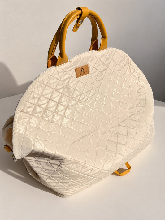 Sac DeixGo beige fermé, avec poignées et finition matelassée